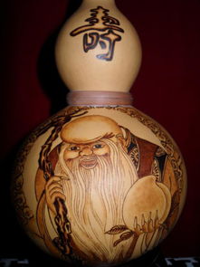 匠心傳承 烙畫葫蘆與壽星茶罐的藝術魅力